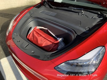 in use image MegaMat TXY packed size in the front of a car