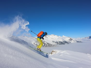 in use image Couloir dark lava skiing down a snowy hill