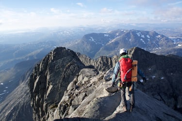 walking on a mountain peak