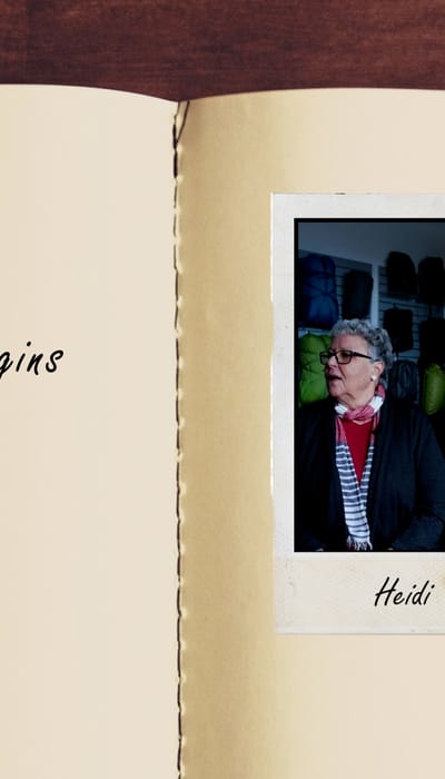 Offenes Buch mit Polaroid von Andi und Heidi