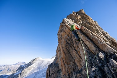 climbing on top of the mountain