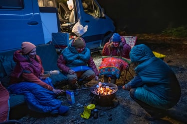 Group sitting aroud a fire