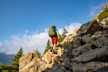 hiking over rocks on mountains