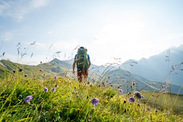 hiking over grasslands on mountains