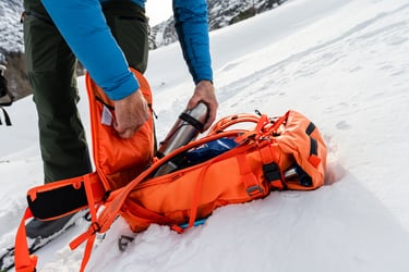 in use image Couloir dark lava taking out a bottle from the back side