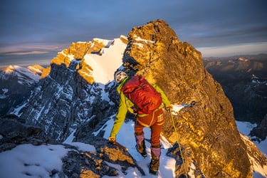 climbing on top of the mountain