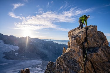 climbing on top of the mountain