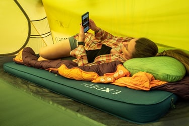 Person relaxing on Deepsleep camping mat