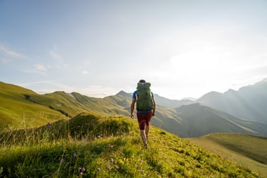 hiking over grasslands on mountains