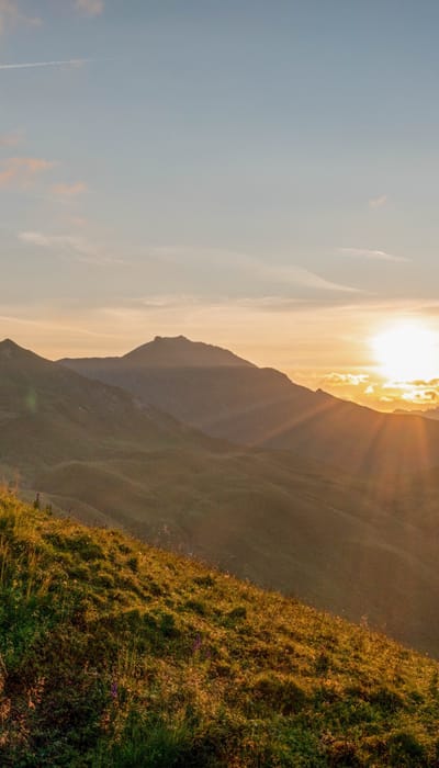 Sunrise with a man on a Ultra trekking mat 